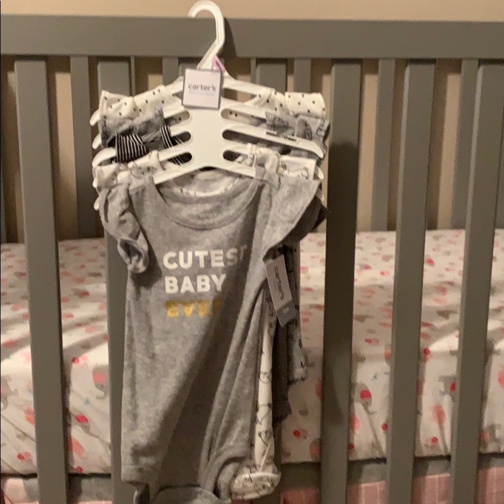 Brand new Carter’s 5 piece short sleeved onesies